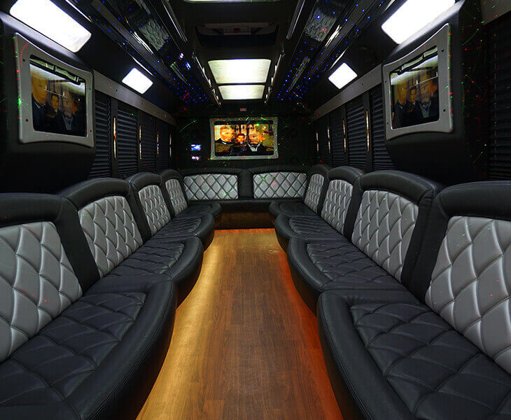 party bus interior with TVs